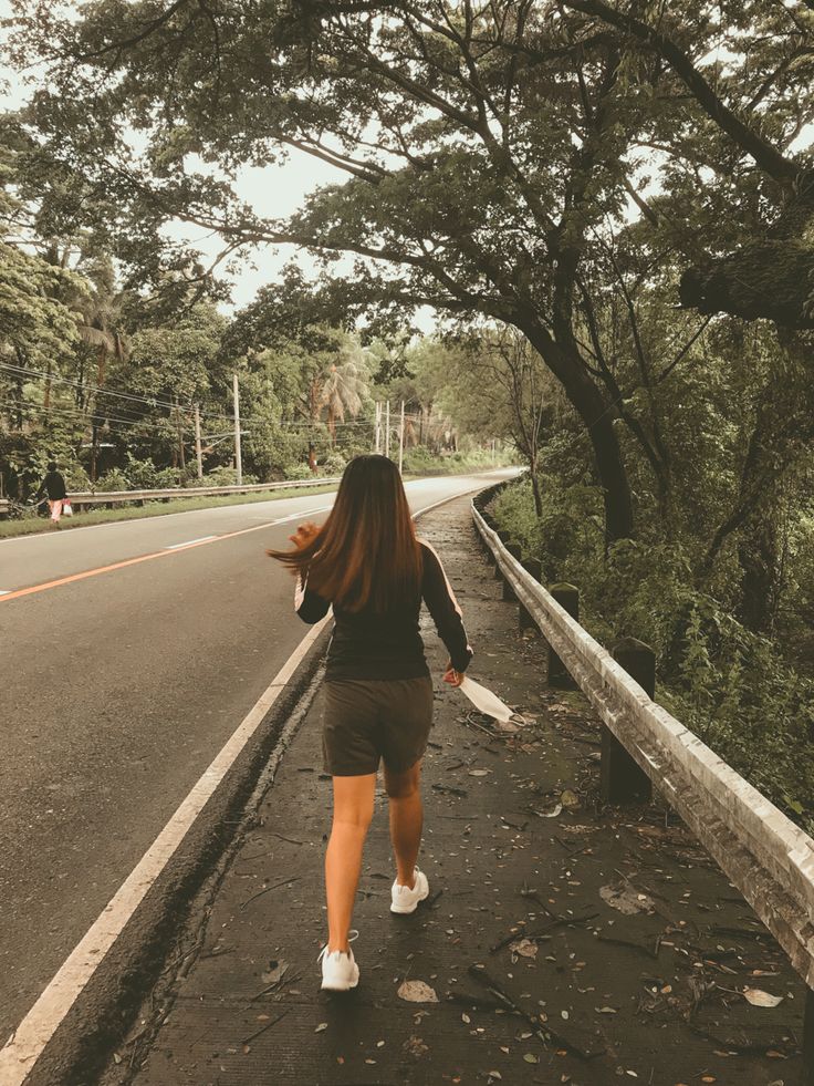 A woman jogging outdoors in the morning, embracing movement as part of a healthy and active lifestyle.