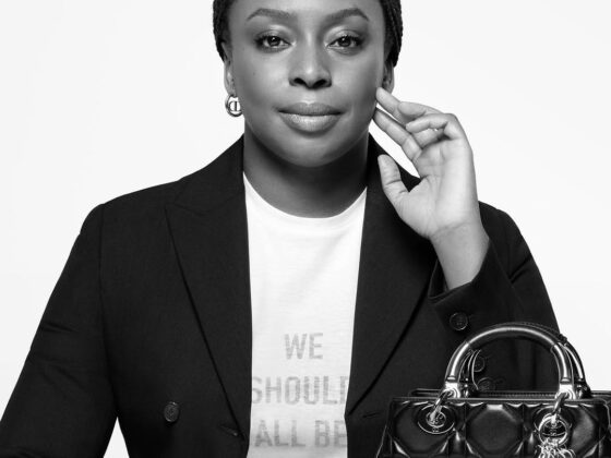 A captivating photo of Chimamanda Ngozi Adichie, the renowned Nigerian writer, looking poised and confident. Her expression reflects wisdom and resilience, embodying the strength that defines her journey.