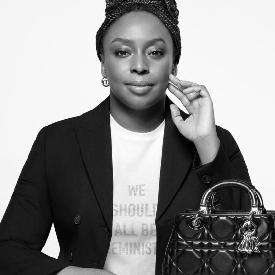 A captivating photo of Chimamanda Ngozi Adichie, the renowned Nigerian writer, looking poised and confident. Her expression reflects wisdom and resilience, embodying the strength that defines her journey.