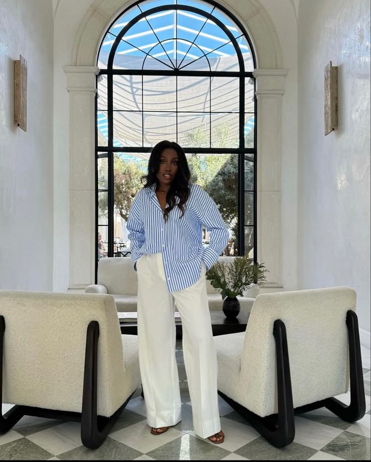 An oversized button-down with pleated trousers, modest summer outfit