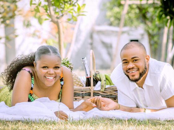Happy couple spending time together outdoors — example of date ideas for Christian couple.