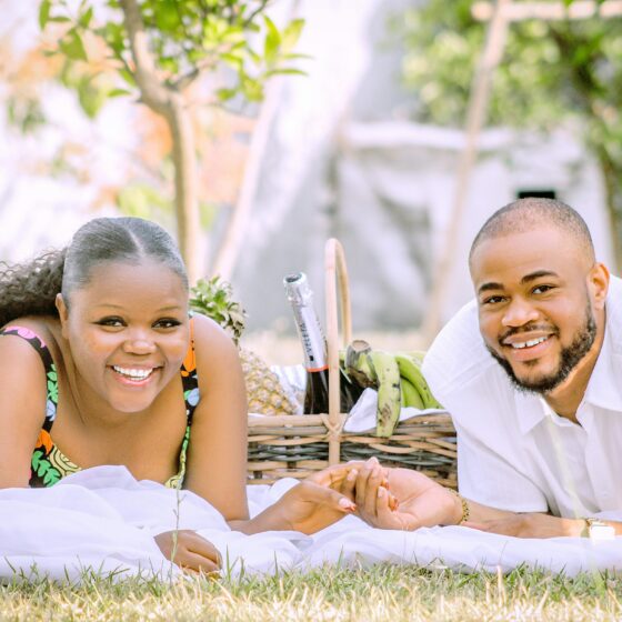 Happy couple spending time together outdoors — example of date ideas for Christian couple.