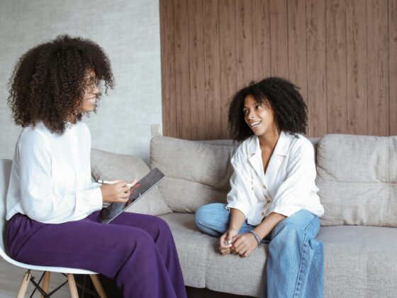 Black woman in therapy prioritising her mental health