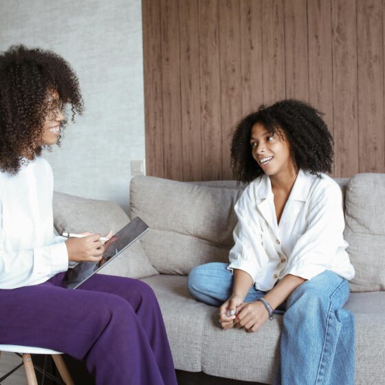 Black woman in therapy prioritising her mental health