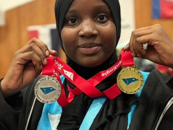 Nafisa Aminu celebrates winning the global English competition in London.