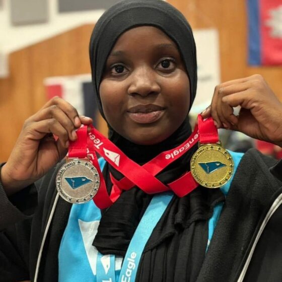 Nafisa Aminu celebrates winning the global English competition in London.