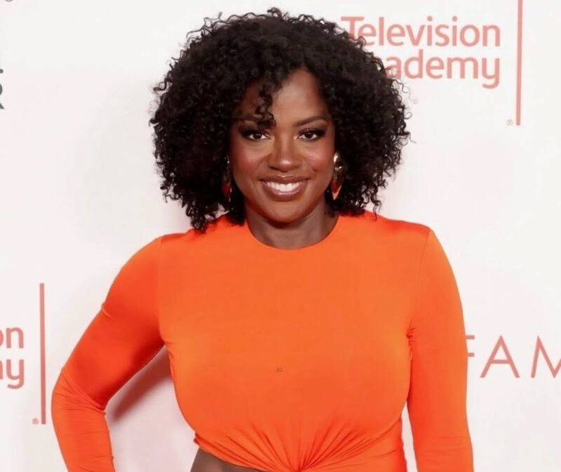 Viola Davis, award-winning actress and EGOT legend, in a powerful portrait highlighting her inspiring journey from poverty to Hollywood success