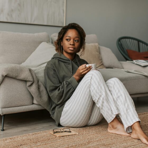 A Christian reflecting with a Bible, symbolizing repentance and restitution.